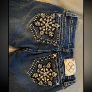 Buckle jeans, boot cut, size 26, inseam 34. Worn only a few times.